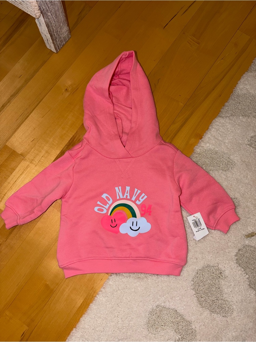 NWT SIZE 0-6 MTHS Old Navy Coral Pink Hoodie with Rainbow & Smiley Cloud Graphic